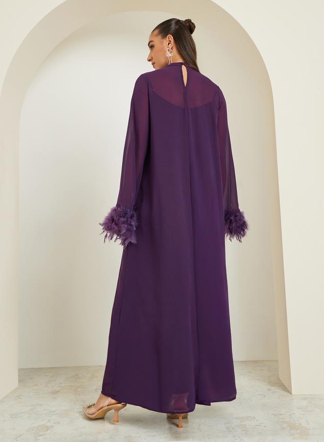 ستايلي فستان طويل سادة بتفاصيل ريش صناعي - Image 4